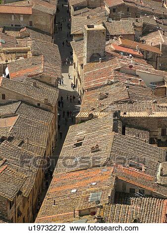 Tuscany, Italy, San Gimignano, Toscana, Europe, Aerial view of the rooftops and medieval town of San Gimignano from Torre Grossa. View Large Photo Image Stock Image - Tuscany, Italy, San Gimignano, Toscana, Europe, Aerial view of the rooftops and medieval town of San Gimignano from Torre Grossa.. Fotosearch