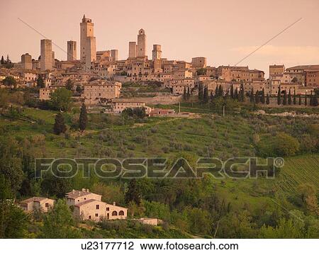 Stock Image -  Tuscany, Italy, San Gimignano, Toscana, Europe, Scenic view of the medieval town of San Gimignano in the Chianti Region.. Fotosearch