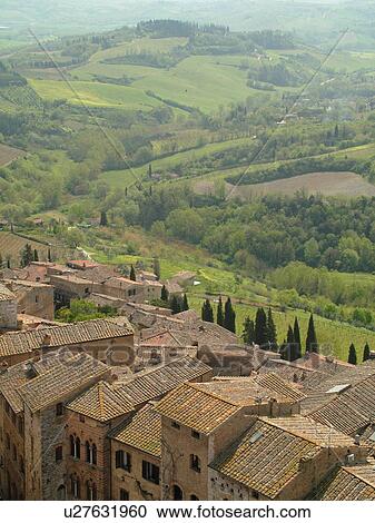 Tuscany, Italy, San Gimignano, Toscana, Europe, Aerial view of the rooftops and medieval town of San Gimignano from Torre Grossa. View Large Photo Image Stock Image - Tuscany, Italy, San Gimignano, Toscana, Europe, Aerial view of the rooftops and medieval town of San Gimignano from Torre Grossa.. Fotosearch