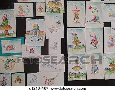 Stock Photo -  Tuscany, Italy, San Gimignano, Toscana, Europe, Watercolor paintings for sale by a street artist in the medieval town of San Gimignano.. Fotosearch