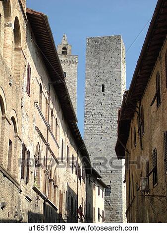Tuscany, Italy, San Gimignano, Toscana, Europe, Buildings along Via San Gimignano in the medieval town of San Gimignano in the Chianti Region. View Large Photo Image Stock Photo - Tuscany, Italy, San Gimignano, Toscana, Europe, Buildings along Via San Gimignano in the medieval town of San Gimignano in the Chianti Region.. Fotosearch