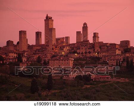 Tuscany, Italy, San Gimignano, Toscana, Europe, Scenic view of the medieval town of San Gimignano at sunrise in the Chianti Region. View Large Photo Image Stock Photo - Tuscany, Italy, San Gimignano, Toscana, Europe, Scenic view of the medieval town of San Gimignano at sunrise in the Chianti Region.. Fotosearch