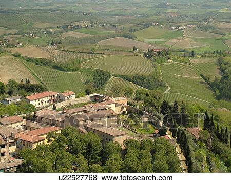 Tuscany, Italy, San Gimignano, Toscana, Europe, Aerial view of the countryside and medieval town of San Gimignano from Torre Grossa. View Large Photo Image Stock Photo - Tuscany, Italy, San Gimignano, Toscana, Europe, Aerial view of the countryside and medieval town of San Gimignano from Torre Grossa.. Fotosearch