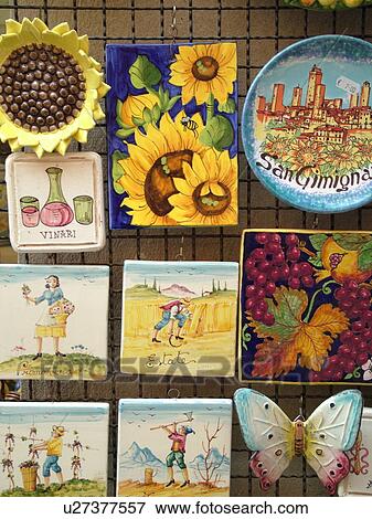 Stock Photo -  Tuscany, Italy, San Gimignano, Toscana, Europe, Ceramic pottery displayed at a local store in the medieval town of San Gimignano.. Fotosearch