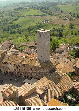 Tuscany, Italy, San Gimignano, Toscana, Europe, Aerial view of the rooftops and medieval town of San Gimignano from Torre Grossa. View Large Photo Image Stock Photograph - Tuscany, Italy, San Gimignano, Toscana, Europe, Aerial view of the rooftops and medieval town of San Gimignano from Torre Grossa.. Fotosearch