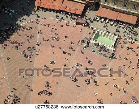 Stock Photograph -  Tuscany, Italy, Siena, Toscana, Europe, Aerial view of the Piazza del Campo in the city of Siena from Torre del Mangia.. Fotosearch