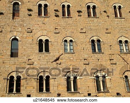 Stock Photography -  Tuscany, Italy, Volterra, Toscana, Europe, Palazzo dei Priori in the medieval hill town of Volterra.. Fotosearch