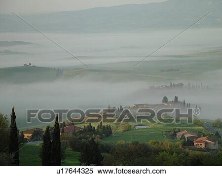 Tuscany, Pienza, Italy, Toscana, Europe, Scenic countryside of Tuscany in the fog in Pienza. View Large Photo Image Stock Photography - Tuscany, Pienza, Italy, Toscana, Europe, Scenic countryside of Tuscany in the fog in Pienza.. Fotosearch