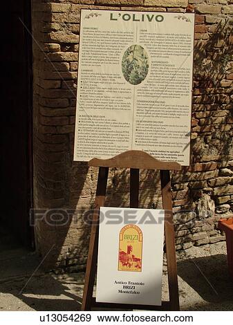 Umbria, Italy, Montefalco, Europe, Information sign outside an Olive tasting room in the medieval town of Montefalco. View Large Photo Image Stock Photo - Umbria, Italy, Montefalco, Europe, Information sign outside an Olive tasting room in the medieval town of Montefalco.. Fotosearch
