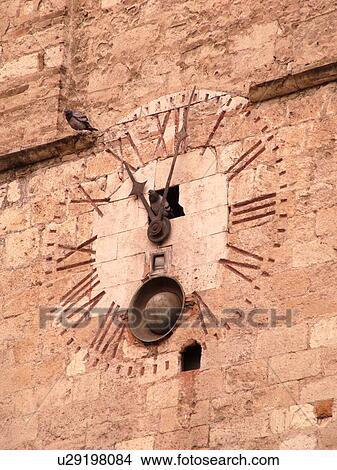 Umbria, Italy, Narni, Europe, Clock with roman numerals on an old building in the medieval town of Narni. View Large Photo Image Picture - Umbria, Italy, Narni, Europe, Clock with roman numerals on an old building in the medieval town of Narni.. Fotosearch