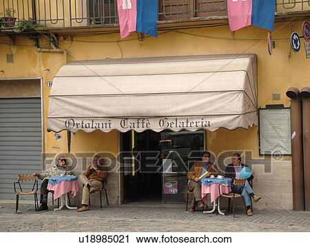 Umbria, Italy, Narni, Europe, Italian men sitting at an outdoor cafT in Piazza Garibaldi in the medieval town of Narni. View Large Photo Image Stock Image - Umbria, Italy, Narni, Europe, Italian men sitting at an outdoor cafT in Piazza Garibaldi in the medieval town of Narni.. Fotosearch