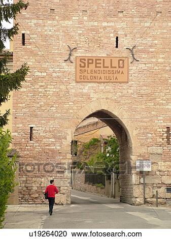 Stock Image -  Umbria, Italy, Spello, Europe. Entrance gate to the town of Spello.. Fotosearch