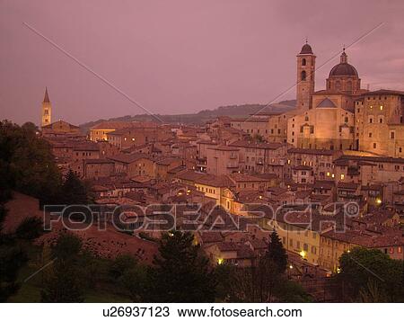 Urbino, Marche, Italy, Europe, Scenic view of the medieval hill town of Urbino in the evening. View Large Photo Image Stock Image - Urbino, Marche, Italy, Europe, Scenic view of the medieval hill town of Urbino in the evening.. Fotosearch