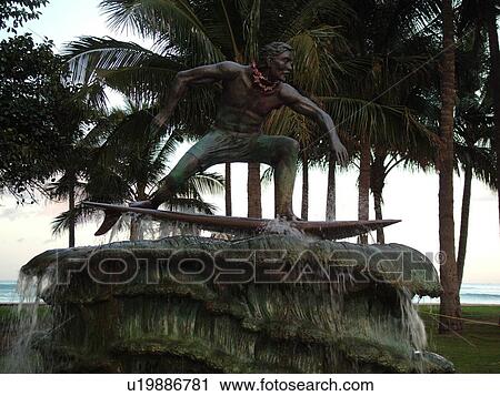 Stock Image -  Waikiki, Honolulu, Oahu, HI, Hawaii, Queen's Surf Beach, Statue of surfer. Fotosearch