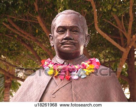 Waikiki, Honolulu, Oahu, HI, Hawaii, Kuhio Beach Park, Prince Kuhio Statue with leis around his neck, dressed in business suit, similar to what he wore as a delegate to Congress View Large Photo Image Stock Photo -  Waikiki, Honolulu, Oahu, HI, Hawaii, Kuhio Beach Park, Prince Kuhio Statue with leis around his neck, dressed in business suit, similar to what he wore as a delegate to Congress. Fotosearch
