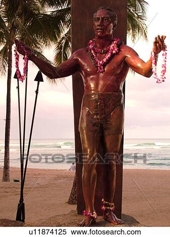 Stock Photography -  Waikiki, Honolulu, Oahu, HI, Hawaii, Kuhio Beach Park, Duke Kahanamoku Statue, leis. Fotosearch