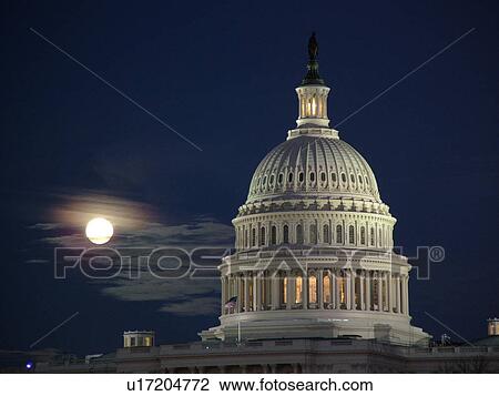 Washington, DC, District of Columbia, D. C United States Capitol Building on Capitol Hill in the nation's capital, full moon rising, evening View Large Photo Image Stock Image - Washington, DC, District of Columbia, D. C United States Capitol Building on Capitol Hill in the nation's capital, full moon rising, evening. Fotosearch