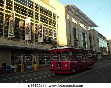 Stock Photograph -  Washington, DC, District of Columbia, D. C downtown, MCI Center, 7th Street, red trolley bus. Fotosearch