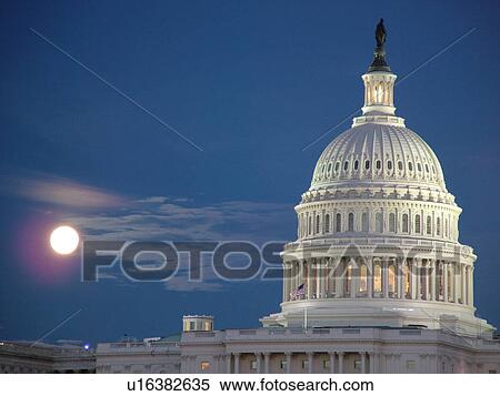 Washington, DC, District of Columbia, D. C United States Capitol Building on Capitol Hill in the nation's capital, full moon rising, evening View Large Photo Image Stock Photography - Washington, DC, District of Columbia, D. C United States Capitol Building on Capitol Hill in the nation's capital, full moon rising, evening. Fotosearch