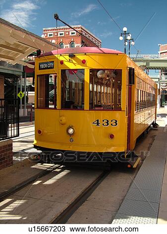 Stock Image -  Ybor City, FL, Florida, Tampa, Tampa Bay, Hillsborough Area Regional Transit, Tampa Bay Streetcar System, Teco Line, yellow streetcar. Fotosearch