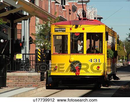 Ybor City, FL, Florida, Tampa, Tampa Bay, Hillsborough Area Regional Transit, Tampa Bay Streetcar System, Teco Line, yellow streetcar, decorated for Christmas holidays View Large Photo Image Stock Image - Ybor City, FL, Florida, Tampa, Tampa Bay, Hillsborough Area Regional Transit, Tampa Bay Streetcar System, Teco Line, yellow streetcar, decorated for Christmas holidays. Fotosearch
