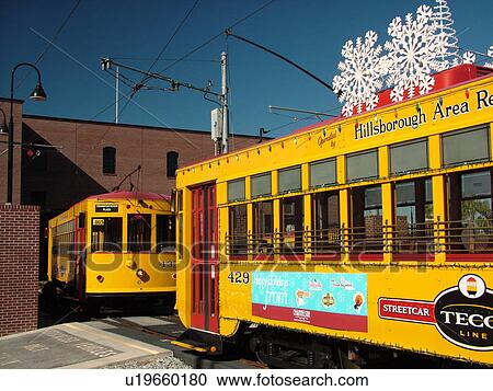 Ybor City, FL, Florida, Tampa, Tampa Bay, Hillsborough Area Regional Transit, Tampa Bay Streetcar System, Teco Line, yellow streetcar, decorated for Christmas holidays View Large Photo Image Stock Image - Ybor City, FL, Florida, Tampa, Tampa Bay, Hillsborough Area Regional Transit, Tampa Bay Streetcar System, Teco Line, yellow streetcar, decorated for Christmas holidays. Fotosearch