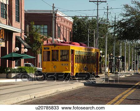Ybor City, FL, Florida, Tampa, Tampa Bay, Hillsborough Area Regional Transit, Tampa Bay Streetcar System, Teco Line, yellow streetcar View Large Photo Image Stock Image - Ybor City, FL, Florida, Tampa, Tampa Bay, Hillsborough Area Regional Transit, Tampa Bay Streetcar System, Teco Line, yellow streetcar. Fotosearch