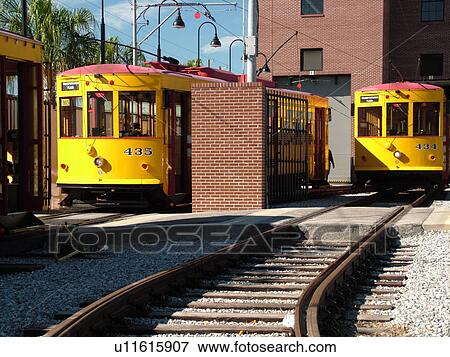 Stock Photo -  Ybor City, FL, Florida, Tampa, Tampa Bay, Hillsborough Area Regional Transit, Tampa Bay Streetcar System, Teco Line, yellow streetcar. Fotosearch