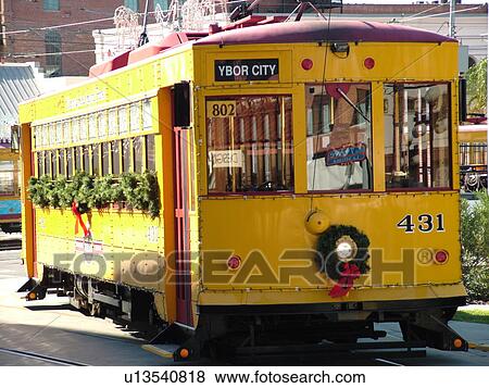 Ybor City, FL, Florida, Tampa, Tampa Bay, Hillsborough Area Regional Transit, Tampa Bay Streetcar System, Teco Line, yellow streetcar, decorated for Christmas holidays View Large Photo Image Stock Photo - Ybor City, FL, Florida, Tampa, Tampa Bay, Hillsborough Area Regional Transit, Tampa Bay Streetcar System, Teco Line, yellow streetcar, decorated for Christmas holidays. Fotosearch