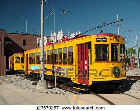 Ybor City, FL, Florida, Tampa, Tampa Bay, Tampa Bay Streetcar System, Teco Line, Hillsborough Area Regional Transit, yellow streetcar, decorated for Christmas holidays View Large Photo Image Stock Photo - Ybor City, FL, Florida, Tampa, Tampa Bay, Tampa Bay Streetcar System, Teco Line, Hillsborough Area Regional Transit, yellow streetcar, decorated for Christmas holidays. Fotosearch