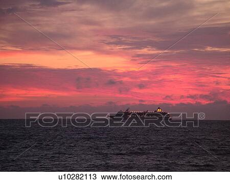 Stock Image -  Acadia National Park, ME, Maine, Atlantic Ocean, Mount Desert Island, sunrise, cruise ship. Fotosearch