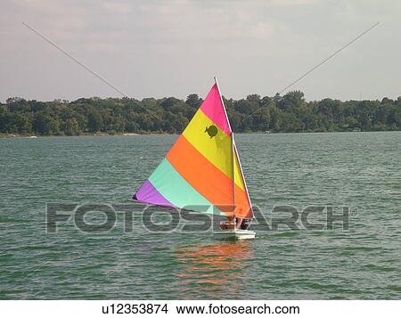 Alexandria, MN, Minnesota, Maple Lake, couple sailing, sunfish, sailboat View Large Photo Image Picture - Alexandria, MN, Minnesota, Maple Lake, couple sailing, sunfish, sailboat. Fotosearch