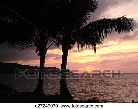 Stock Image -  Anini, Princeville, Kauai, HI, Hawaii, North Shore, Anini beach, sunset. Fotosearch