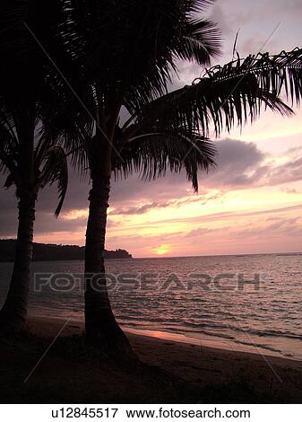 Stock Photo -  Anini, Princeville, Kauai, HI, Hawaii, North Shore, Anini beach, sunset. Fotosearch