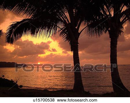 Stock Photo -  Anini, Princeville, Kauai, HI, Hawaii, North Shore, Anini beach, sunset. Fotosearch