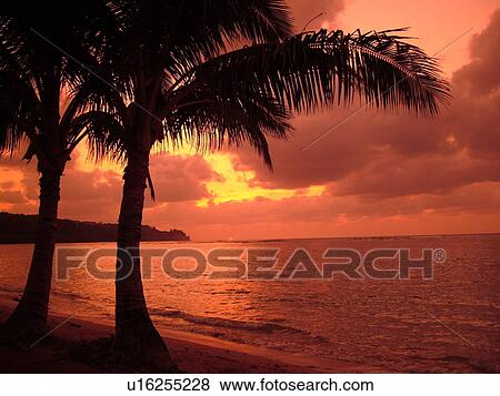 Stock Photo -  Anini, Princeville, Kauai, HI, Hawaii, North Shore, Anini beach, sunset. Fotosearch
