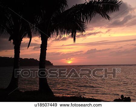 Stock Photo -  Anini, Princeville, Kauai, HI, Hawaii, North Shore, Anini beach, sunset. Fotosearch