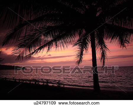 Stock Photo -  Anini, Princeville, Kauai, HI, Hawaii, North Shore, Anini beach, sunset. Fotosearch