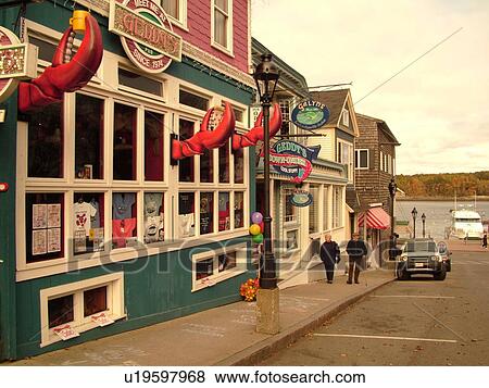 Stock Photo -  Bar Harbor, ME, Maine, Mount Desert Island, Downtown, Main Street, shops and seafood restaurants. Fotosearch