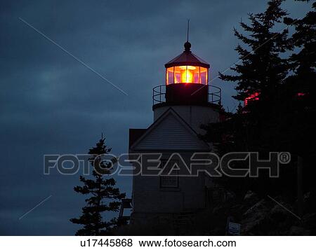 Stock Photo -  Bass Harbor, Acadia National Park, ME, Maine, Atlantic Ocean, Mount Desert Island, Bass Harbor Head Lighthouse, evening. Fotosearch