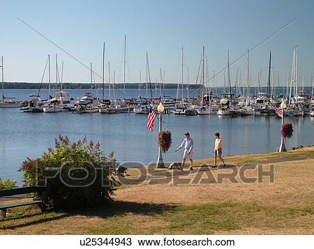Stock Image -  Bayfield, WI, Wisconsin, Lake Superior, lakefront, marina, harbor, recreation path. Fotosearch