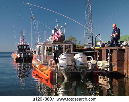 Stock Photo -  Bayfield, WI, Wisconsin, Lake Superior, US Coast Guard Rescue Boat. Fotosearch