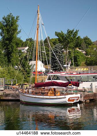Bayfield, WI, Wisconsin, Lake Superior, marina, harbor, wooden sailboat, dock View Large Photo Image Stock Photo - Bayfield, WI, Wisconsin, Lake Superior, marina, harbor, wooden sailboat, dock. Fotosearch