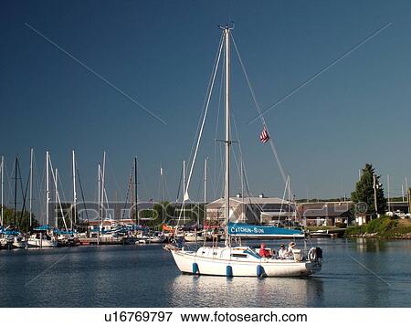 Stock Photo -  Bayfield, WI, Wisconsin, Lake Superior, marina, harbor, sailboat. Fotosearch