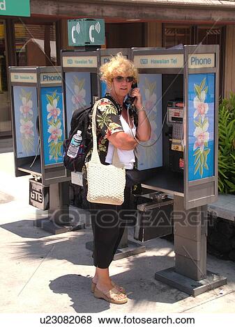 Stock Photo -  Big Island, Island of Hawaii, HI, Hawaii, Kona International Airport at Keahole, telephone booths. Fotosearch