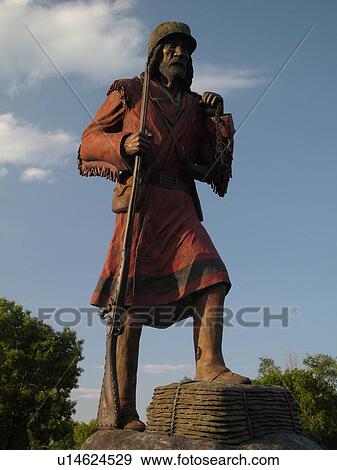 Stock Photo -  Bottineau, ND, North Dakota, Pierre Bottineau Statue. Fotosearch