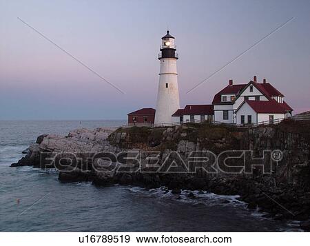 Stock Photo -  Cape Elizabeth, ME, Maine, Portland Head Light Lighthouse, Fort Williams Park, sunset. Fotosearch