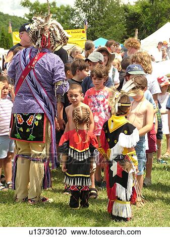 Charlotte, VT, Vermont, Intertribal Pow-Wow, ceremony, tribal gathering, children gather around the story teller View Large Photo Image Stock Image - Charlotte, VT, Vermont, Intertribal Pow-Wow, ceremony, tribal gathering, children gather around the story teller. Fotosearch