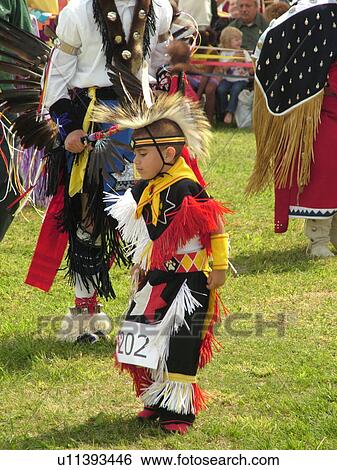 Stock Photograph -  Charlotte, VT, Vermont, Intertribal Pow-Wow, ceremony, tribal gathering, young boy dancing. Fotosearch