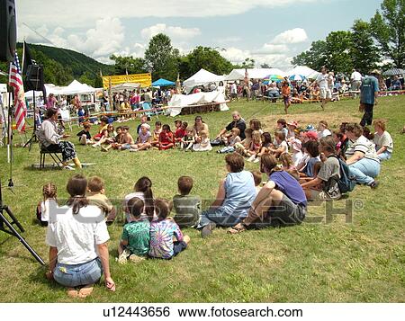 Charlotte, VT, Vermont, Intertribal Pow-Wow, ceremony, tribal gathering, children sit around the story teller View Large Photo Image Stock Photograph - Charlotte, VT, Vermont, Intertribal Pow-Wow, ceremony, tribal gathering, children sit around the story teller. Fotosearch